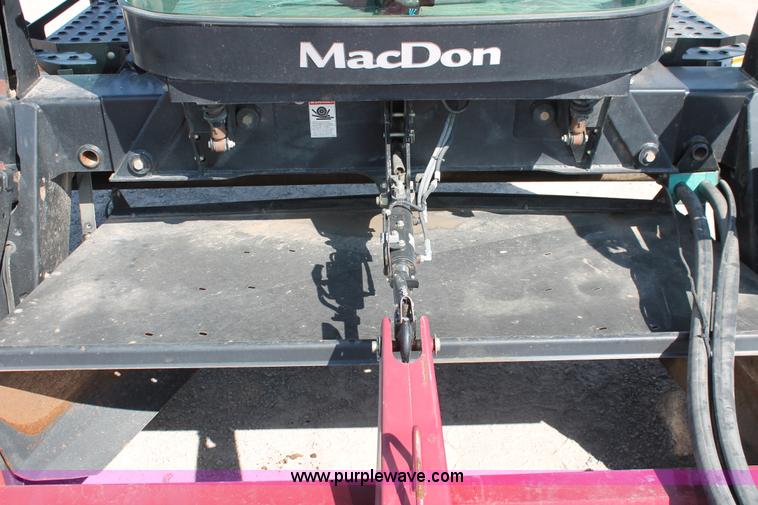 image for item H5860 2011 MacDon M205 self-propelled windrower