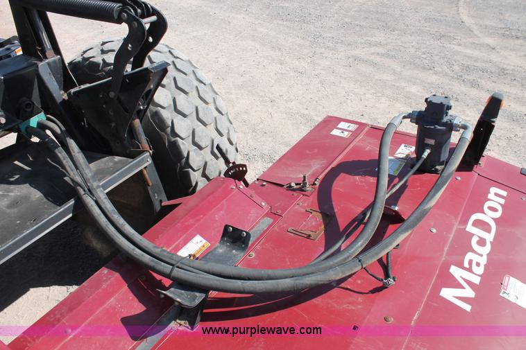 image for item H5860 2011 MacDon M205 self-propelled windrower