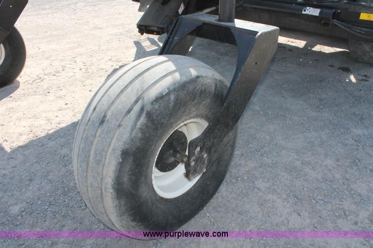 image for item H5860 2011 MacDon M205 self-propelled windrower