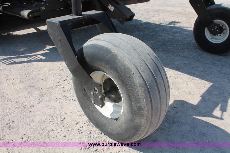 image for item H5860 2011 MacDon M205 self-propelled windrower