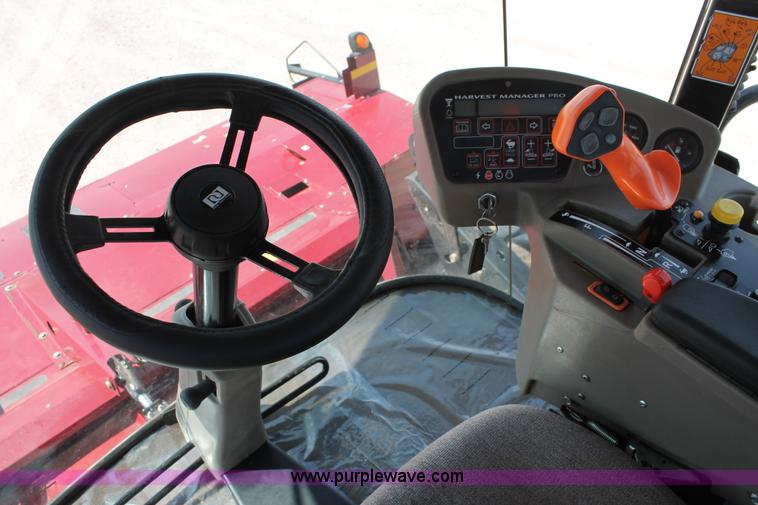 image for item H5861 2013 MacDon M205 self-propelled windrower