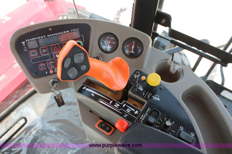 image for item H5861 2013 MacDon M205 self-propelled windrower