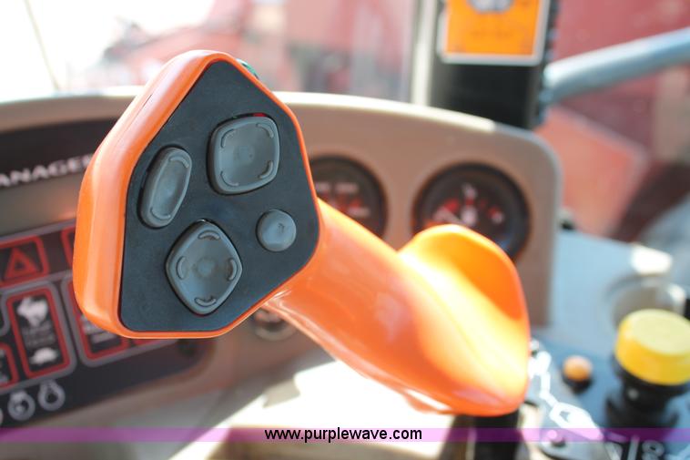 image for item H5861 2013 MacDon M205 self-propelled windrower