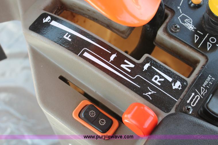 image for item H5861 2013 MacDon M205 self-propelled windrower