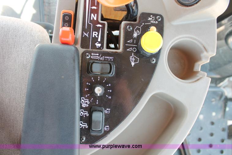 image for item H5861 2013 MacDon M205 self-propelled windrower