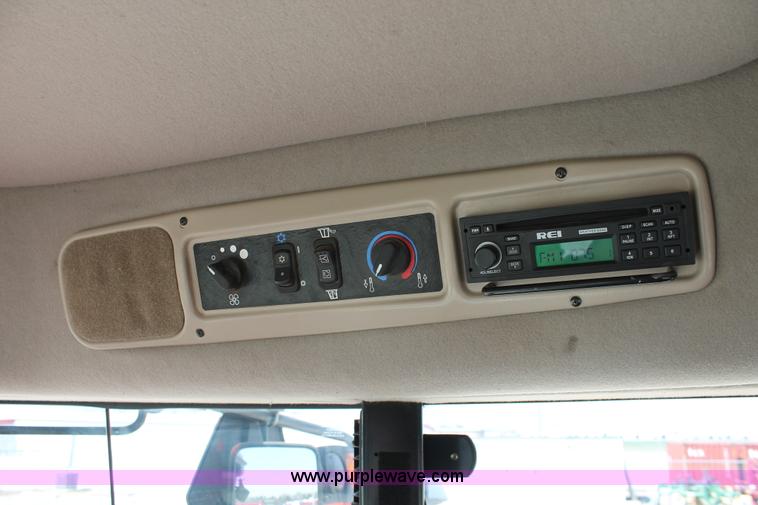 image for item H5861 2013 MacDon M205 self-propelled windrower