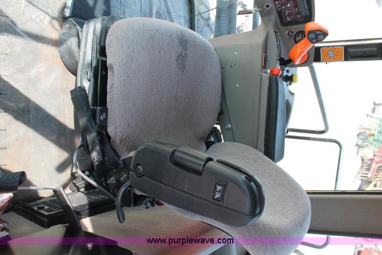 image for item H5861 2013 MacDon M205 self-propelled windrower