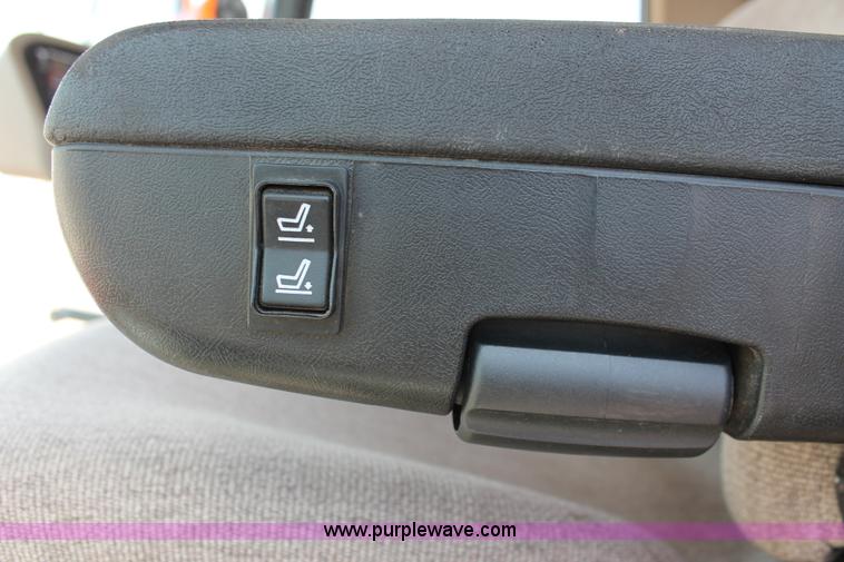 image for item H5861 2013 MacDon M205 self-propelled windrower