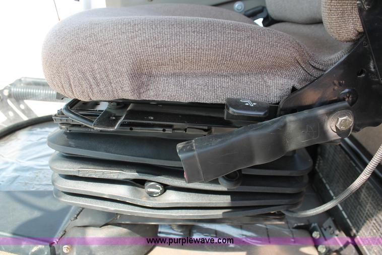 image for item H5861 2013 MacDon M205 self-propelled windrower