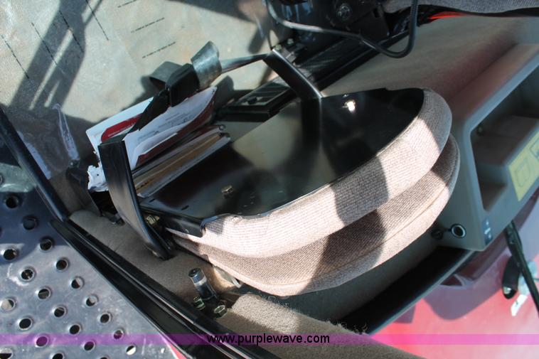 image for item H5861 2013 MacDon M205 self-propelled windrower