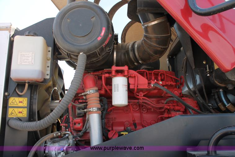 image for item H5861 2013 MacDon M205 self-propelled windrower