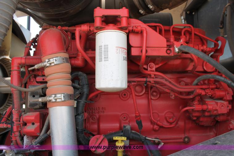 image for item H5861 2013 MacDon M205 self-propelled windrower