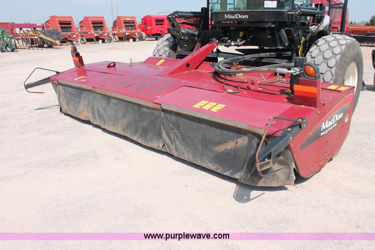 image for item H5861 2013 MacDon M205 self-propelled windrower