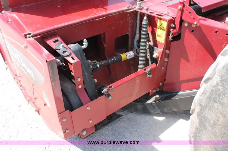 image for item H5861 2013 MacDon M205 self-propelled windrower