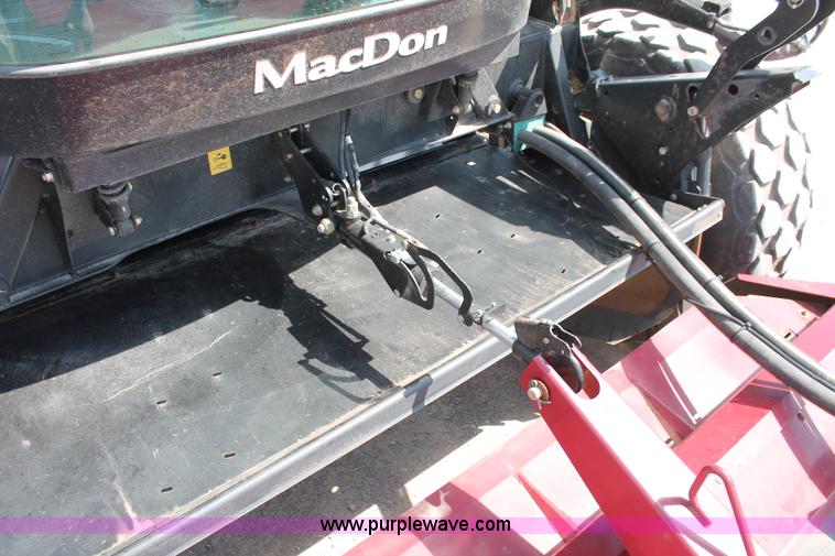 image for item H5861 2013 MacDon M205 self-propelled windrower