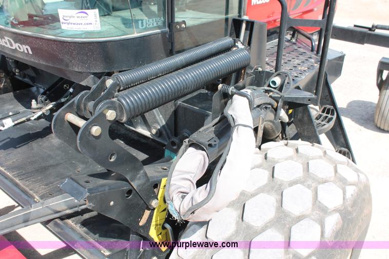 image for item H5861 2013 MacDon M205 self-propelled windrower