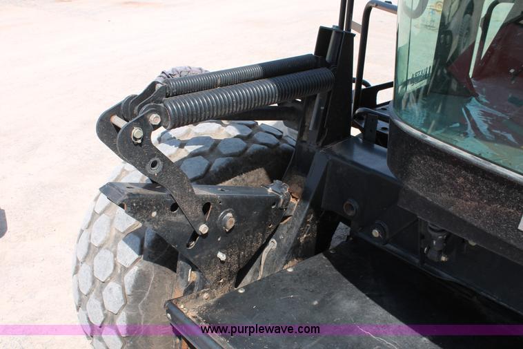 image for item H5861 2013 MacDon M205 self-propelled windrower