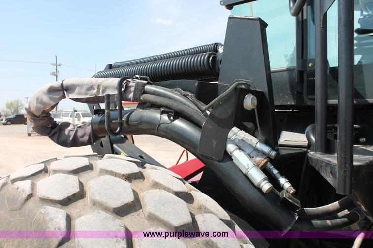 image for item H5861 2013 MacDon M205 self-propelled windrower