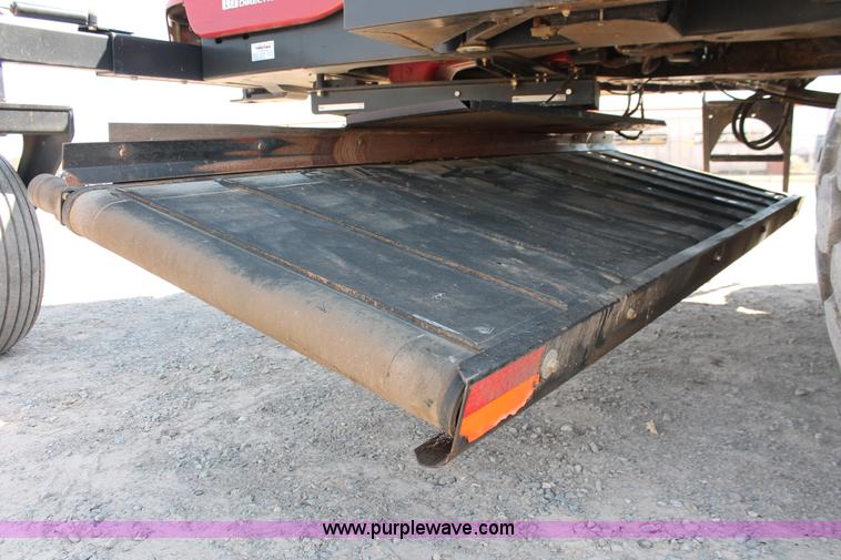 image for item H5861 2013 MacDon M205 self-propelled windrower