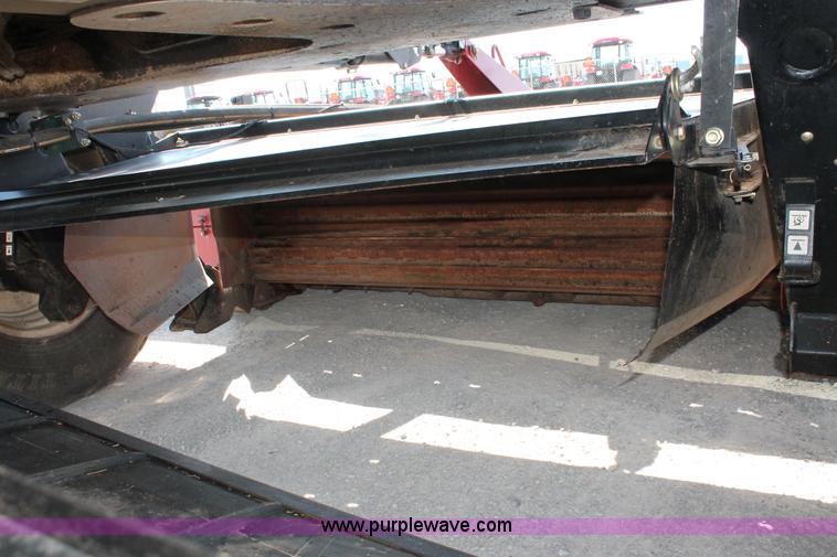 image for item H5861 2013 MacDon M205 self-propelled windrower