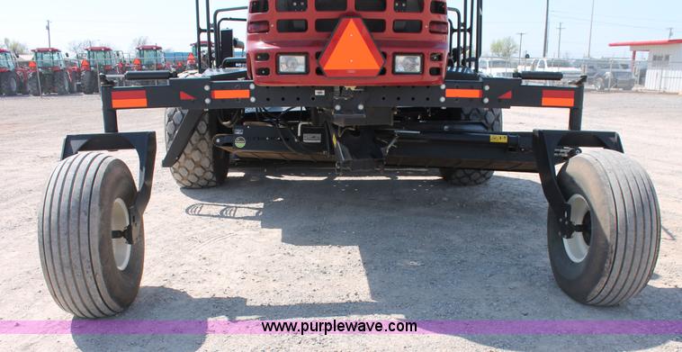 image for item H5861 2013 MacDon M205 self-propelled windrower