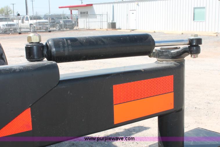 image for item H5861 2013 MacDon M205 self-propelled windrower