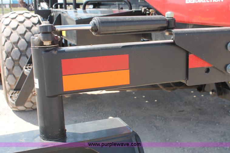 image for item H5861 2013 MacDon M205 self-propelled windrower