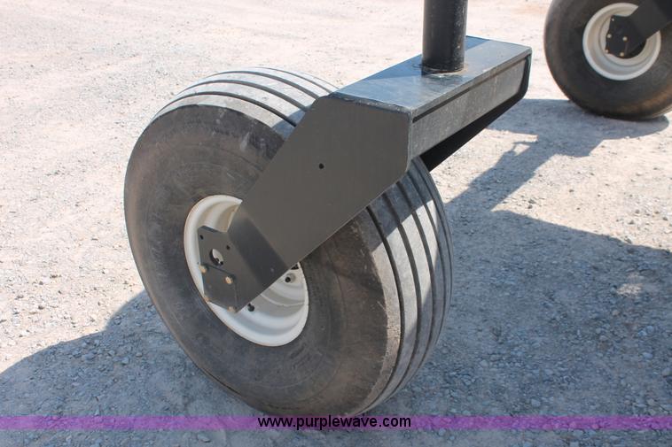 image for item H5861 2013 MacDon M205 self-propelled windrower