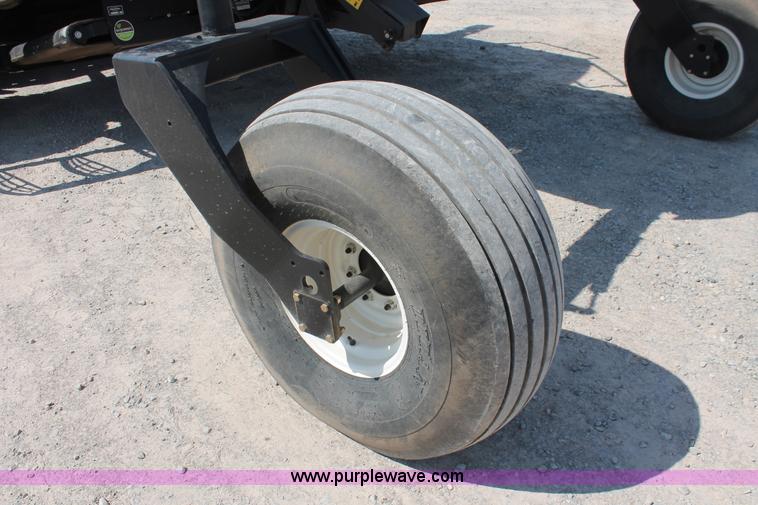 image for item H5861 2013 MacDon M205 self-propelled windrower