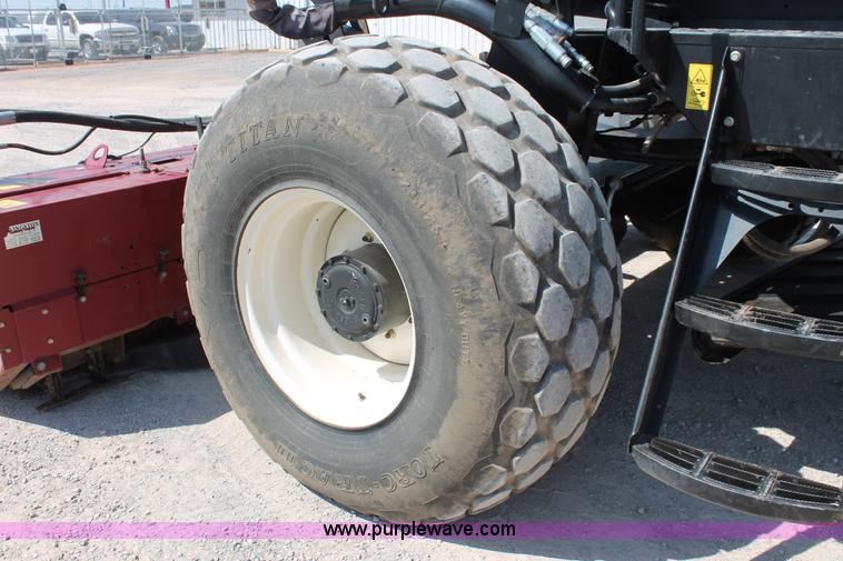 image for item H5861 2013 MacDon M205 self-propelled windrower