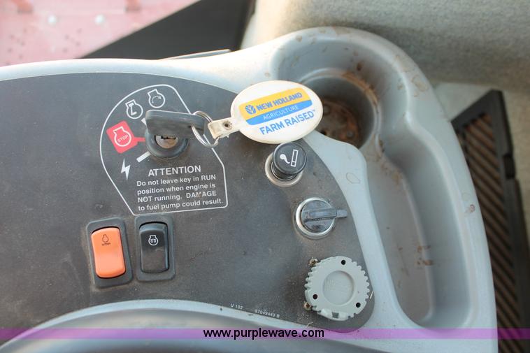 image for item H5862 2011 New Holland H8080 self-propelled windrower