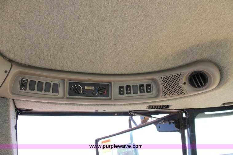 image for item H5862 2011 New Holland H8080 self-propelled windrower