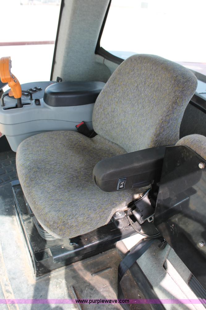 image for item H5862 2011 New Holland H8080 self-propelled windrower