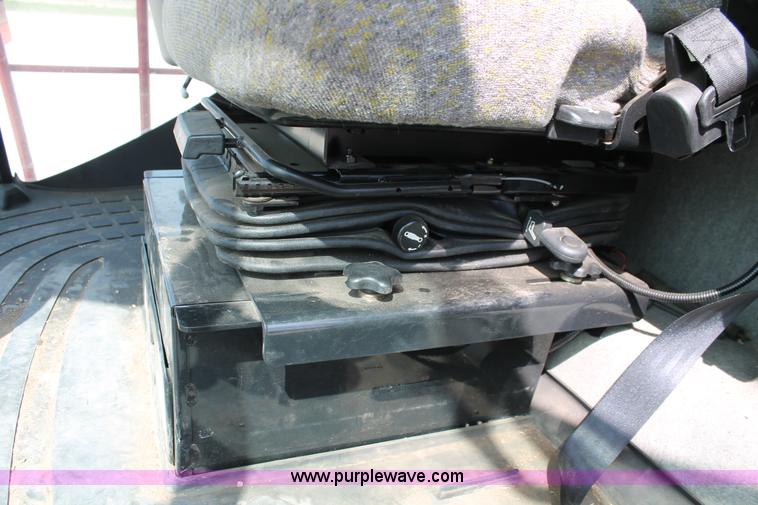 image for item H5862 2011 New Holland H8080 self-propelled windrower