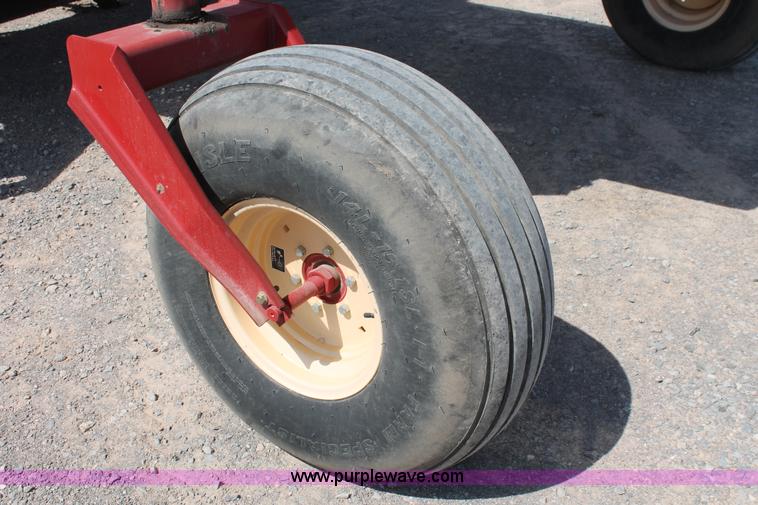 image for item H5862 2011 New Holland H8080 self-propelled windrower