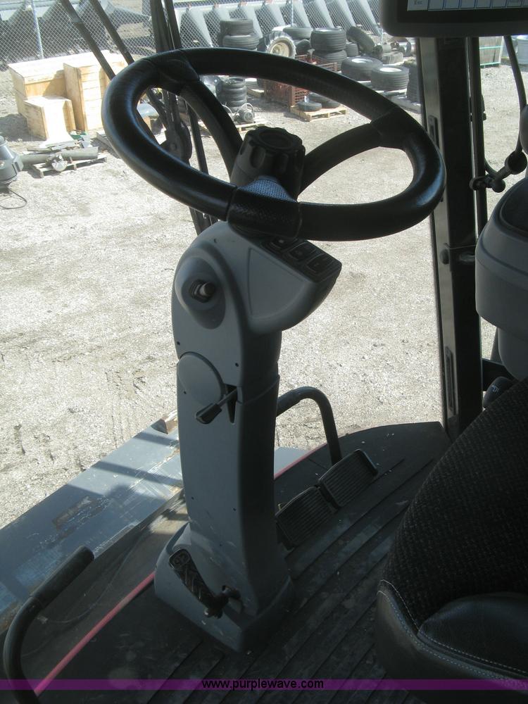 image for item K2999 2011 Massey Ferguson 9560 combine