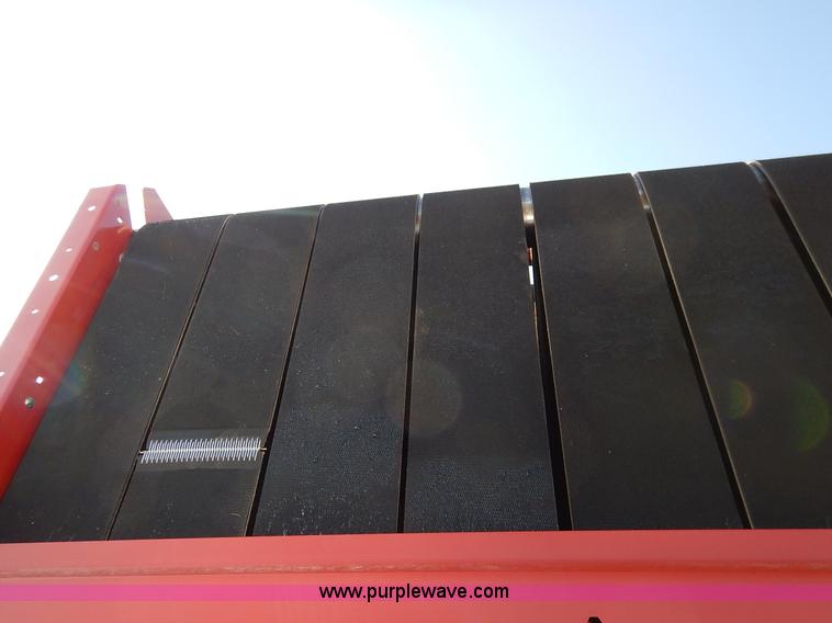 image for item K7369 2009 New Holland BR7090 round baler