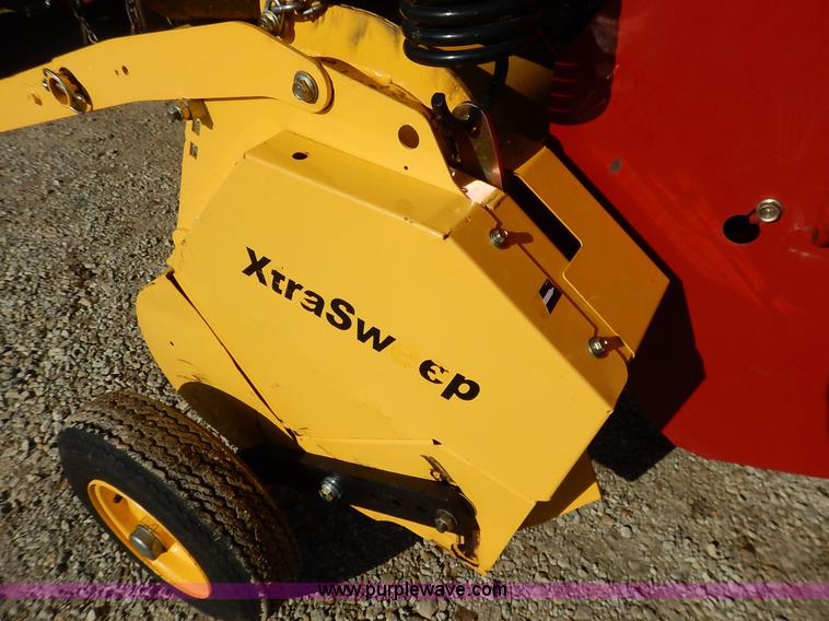 image for item K7369 2009 New Holland BR7090 round baler