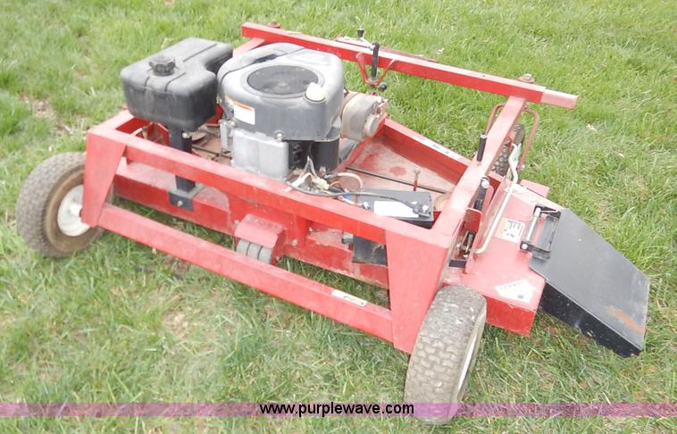 image for item K7410 Swisher pull behind lawn mower