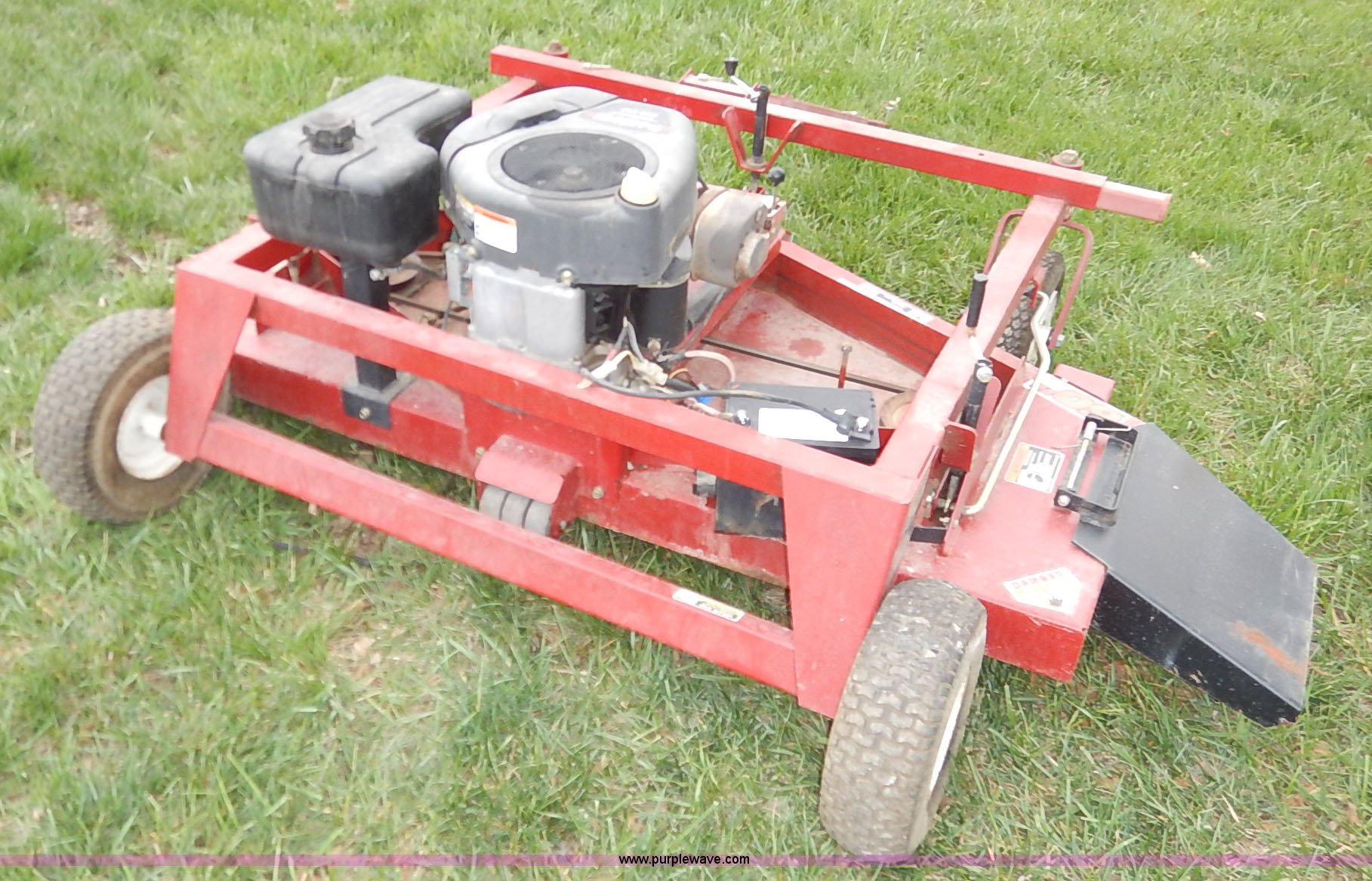 Swisher pull behind lawn mower in Gridley, KS Item K7410 sold Purple Wave