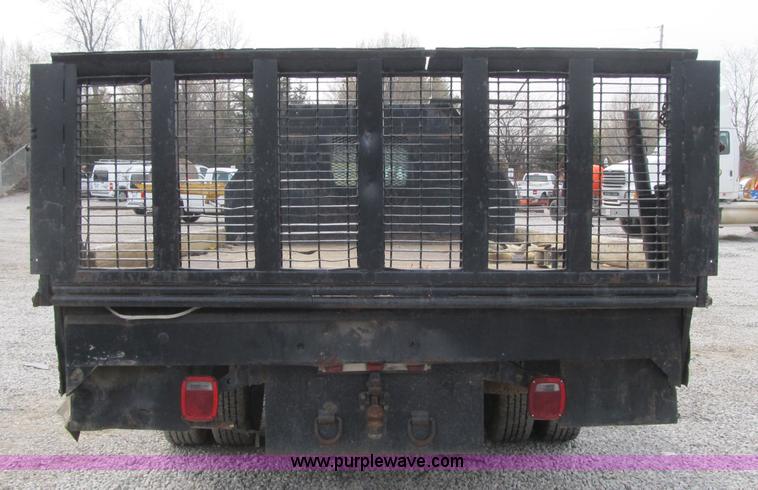 image for item AC9303 1999 Ford F350 Super Duty XL flatbed pickup truck