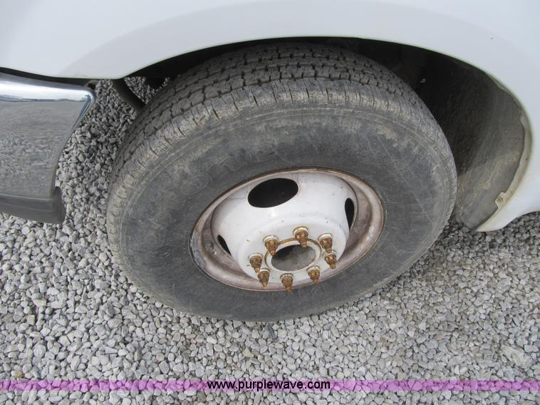 image for item AC9303 1999 Ford F350 Super Duty XL flatbed pickup truck