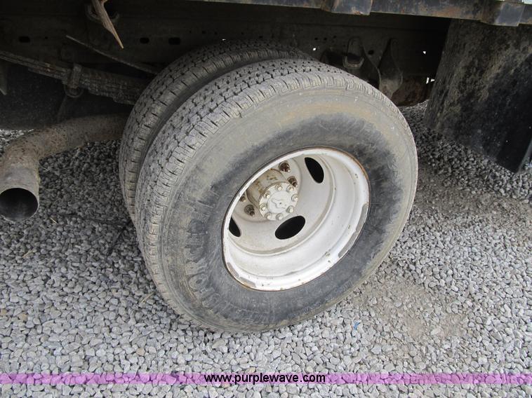 image for item AC9303 1999 Ford F350 Super Duty XL flatbed pickup truck