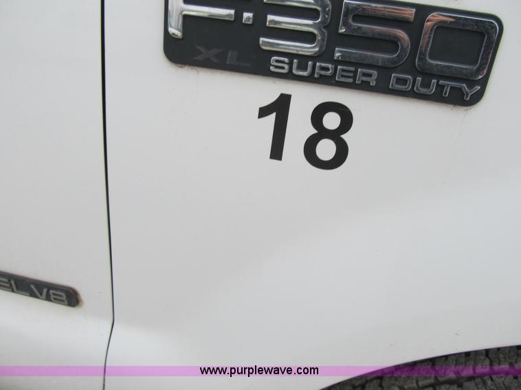 image for item AC9303 1999 Ford F350 Super Duty XL flatbed pickup truck