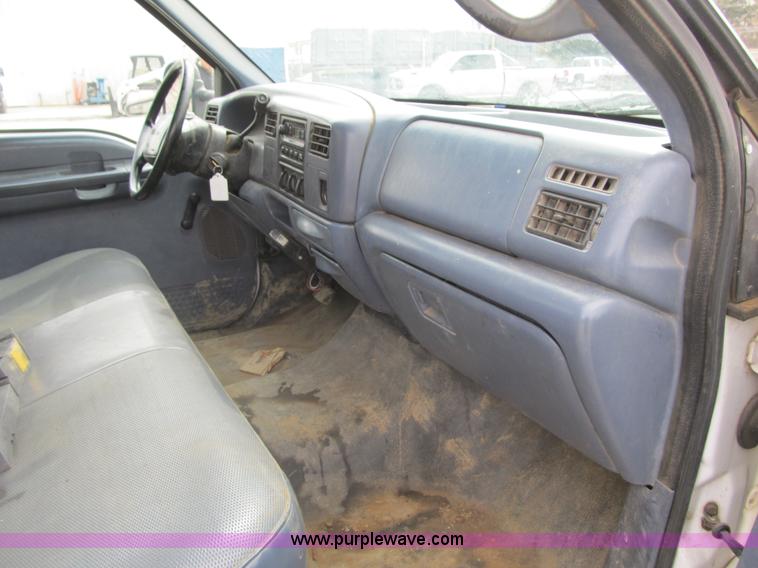 image for item AC9303 1999 Ford F350 Super Duty XL flatbed pickup truck