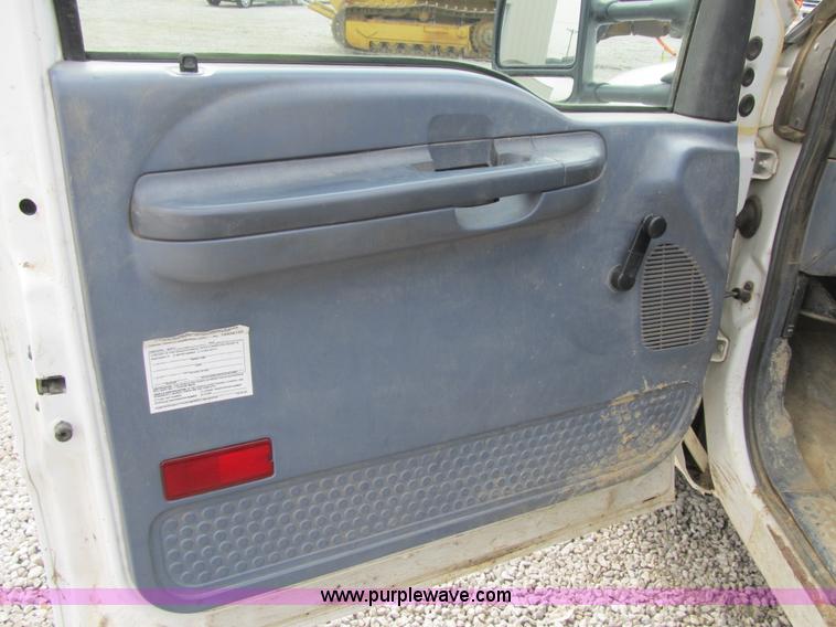 image for item AC9303 1999 Ford F350 Super Duty XL flatbed pickup truck