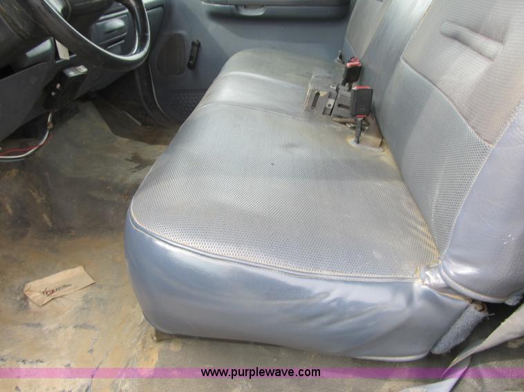 image for item AC9303 1999 Ford F350 Super Duty XL flatbed pickup truck