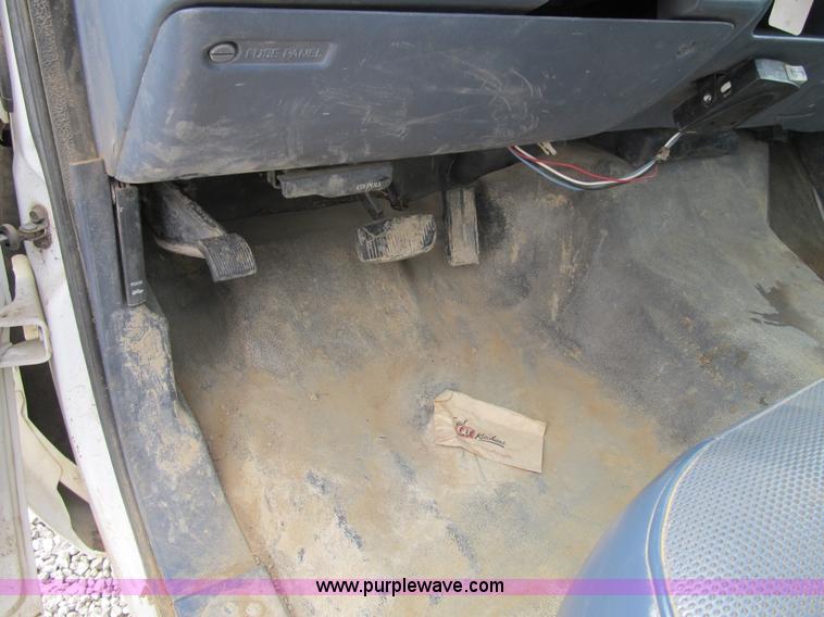 image for item AC9303 1999 Ford F350 Super Duty XL flatbed pickup truck