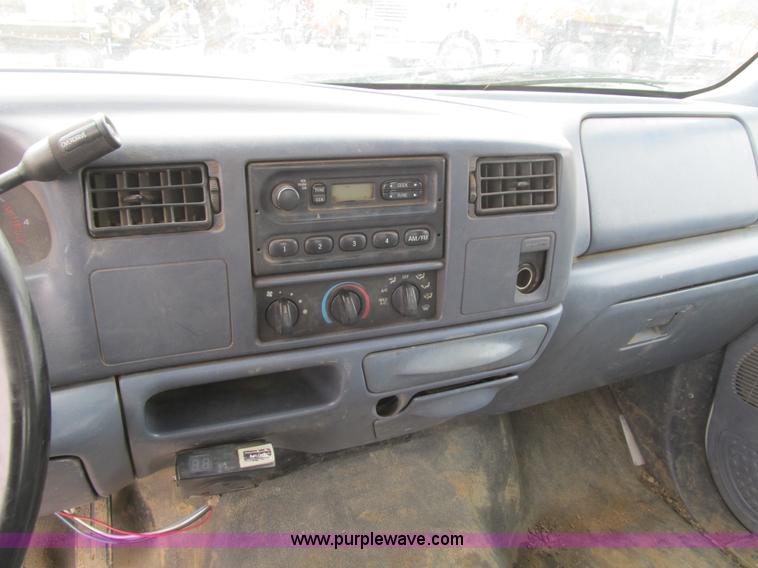 image for item AC9303 1999 Ford F350 Super Duty XL flatbed pickup truck