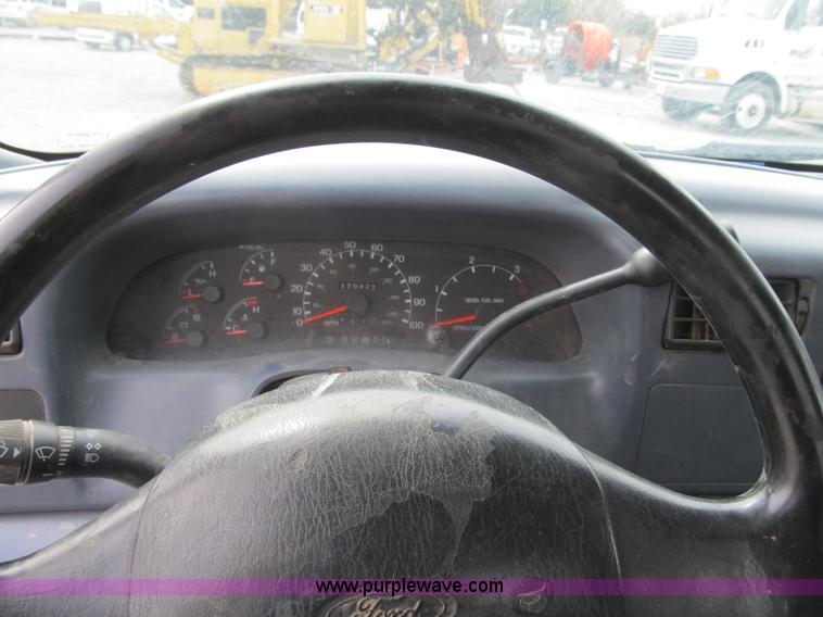 image for item AC9303 1999 Ford F350 Super Duty XL flatbed pickup truck